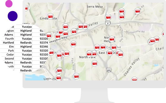 Monitor komputera z mapą i konkretnymi obszarami zaznaczonymi na czerwono