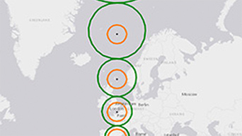 Light gray map of two countries with green and orange circles