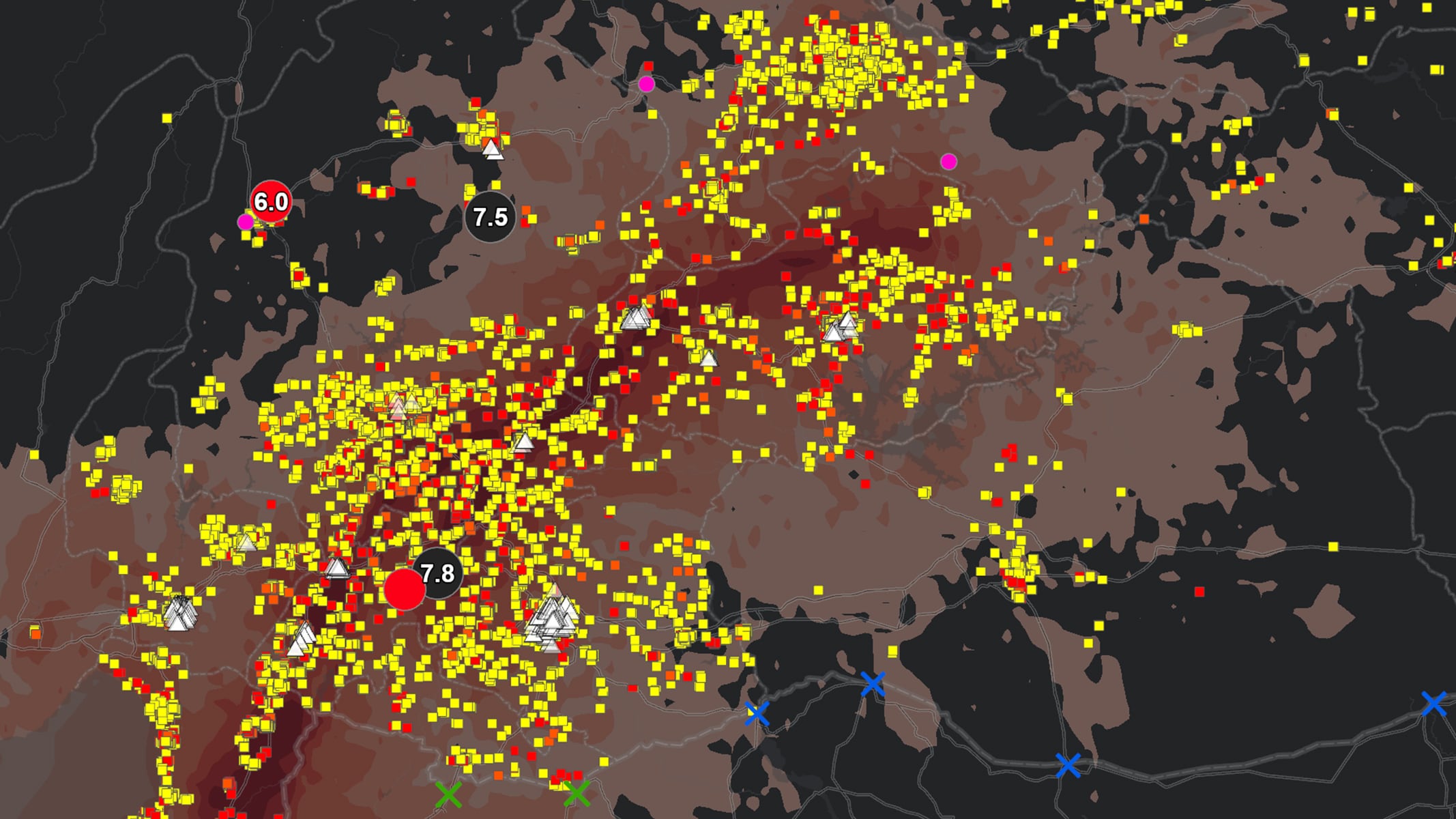 Mappa con terreno di colore marrone e punti di dati sparsi in giallo e rosso 