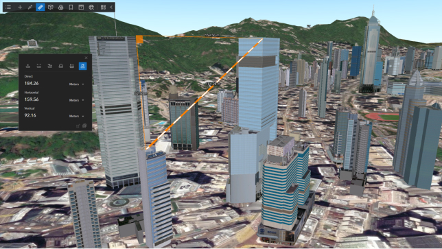 3D scene of a city with several tall buildings and a measurement between two buildings noted with an orange and white line