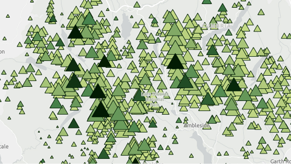 An abstract map visualization is filled with numerous green triangle markers of varying sizes and shades.