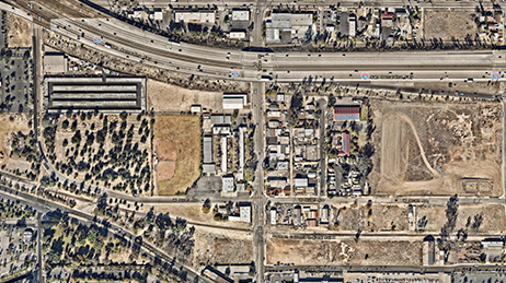 The view from a satellite of a developed area near a freeway