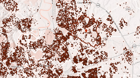 A map of Rome overlaid with thousands of dark red data points and a specific area circled in red with a single red pin