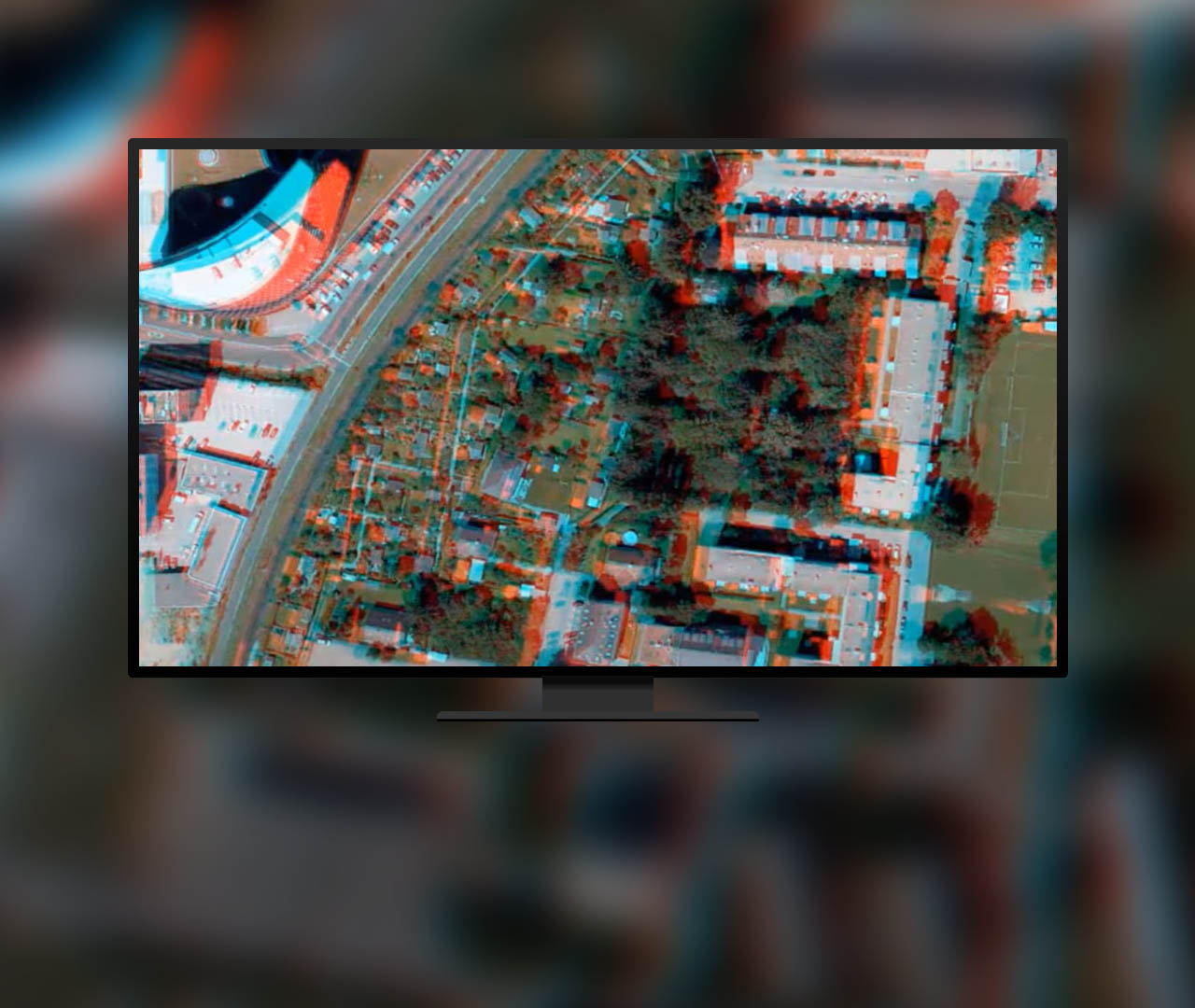 An aerial view of a building haloed with blue and red that uses stereo viewing capabilities