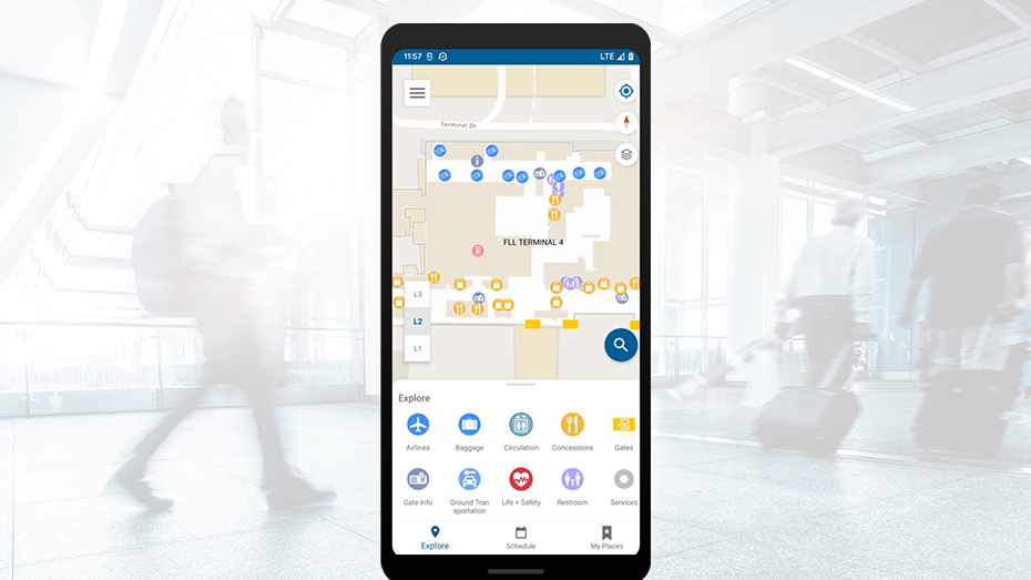 Uno schermo di smartphone che mostra una mappa di interni con cerchi blu e gialli sparsi e icone rotonde
