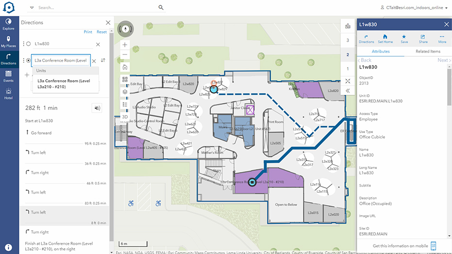 2D indoor map of an office building showing offices in gray and a route highlighted in blue with popup windows and text