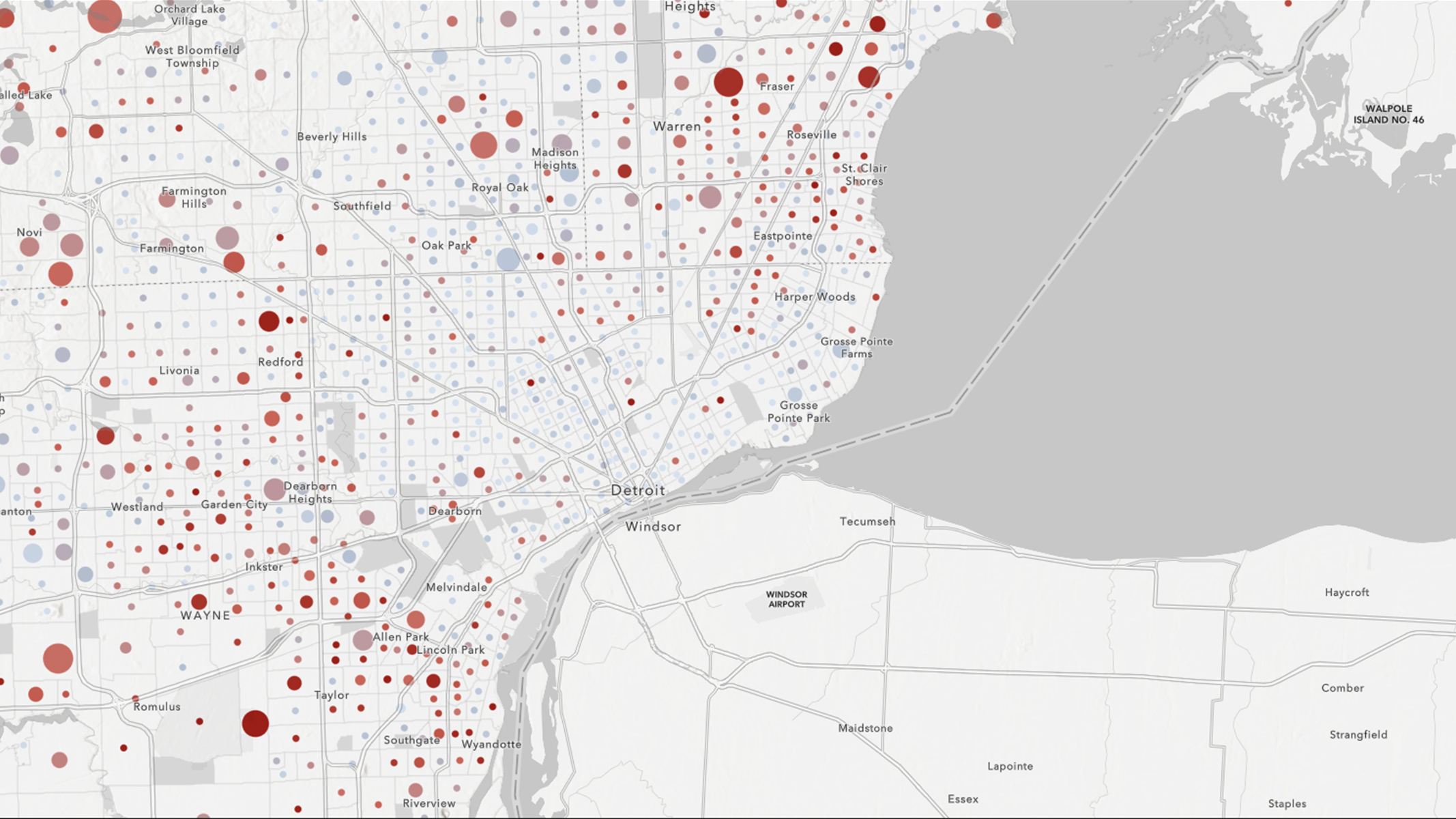 Map of the Detroit metropolitan area with numerous red and blue circles of varying sizes scattered throughout