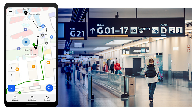 Allée d’un terminal aéroportuaire recouverte de l’image d’un téléphone à écran tactile représentant un logiciel de cartographie en intérieur