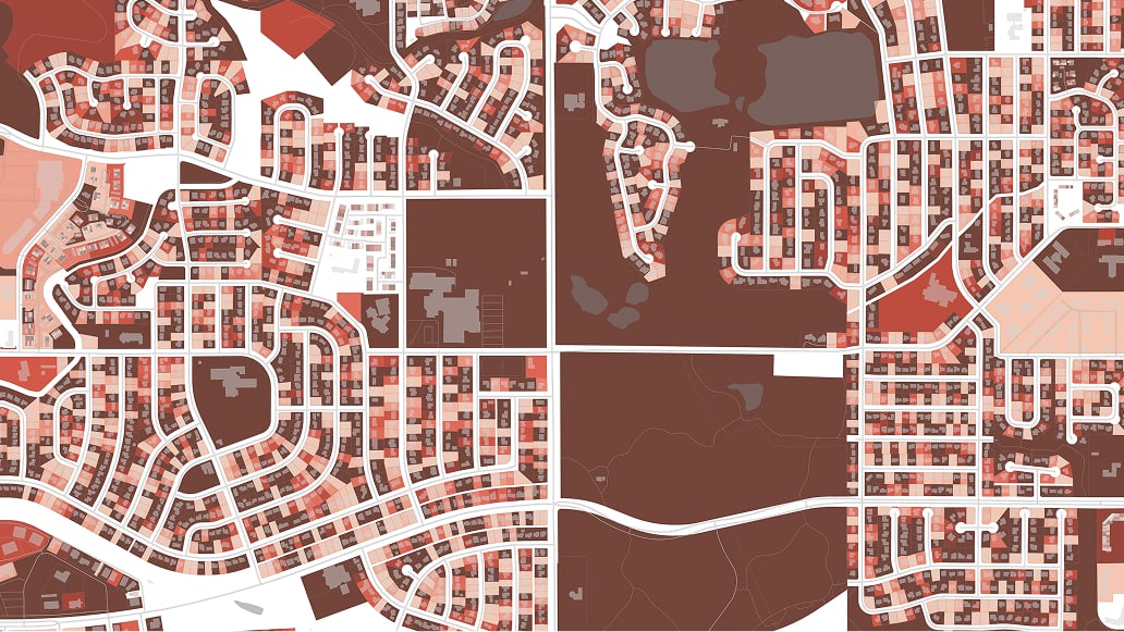 A map with buildings shown in red and streets in white on a grid