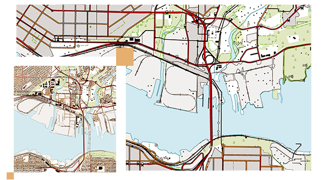 Street map of a city with a blue body of water and black, red, and brown lines 
