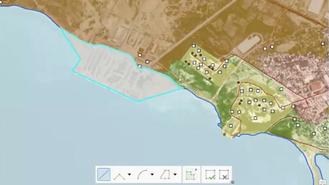 A coastal area where the ocean meets the land captured using using tools in ArcGIS Production Mapping. The map demonstrates the capabilities of ArcGIS Production Mapping tools, such as data capture and automation processes. 