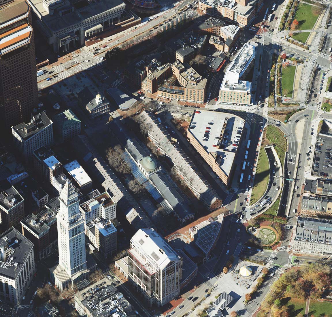 Background image is a photo of the city of Boston, foreground is 3D meshes of the City of Boston morphed together
