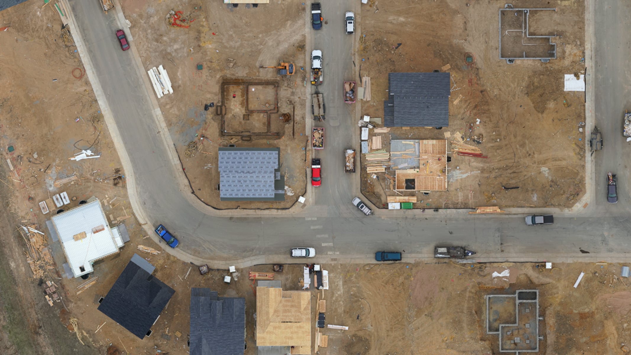 An aerial view of a residential neighborhood after a wildfire 