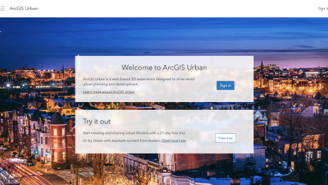 The getting started experience of ArcGIS Urban with white popup boxes and text with the background of a city at night
