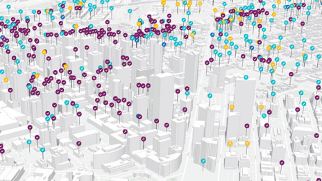 A 3D model with gray buildings and scattered purple and green data points showing the status of projects across the city