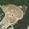 Satellite imagery of Hardeeville, South Carolina, of a central residential area surrounded by lush green crop fields
