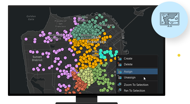 Computer monitor showing San Francisco map with yellow, red, purple, and green dots