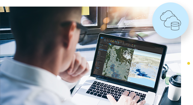 Businessman working with satellite imagery on a laptop