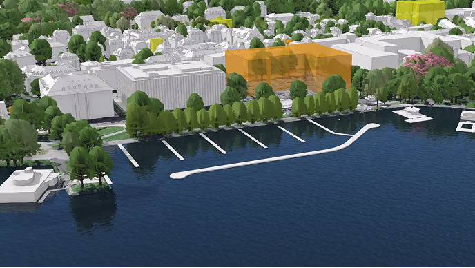 Screencap from featured video with a 3D model of a modern cityscape lined with trees beside the still blue waters of  an oceanside dock