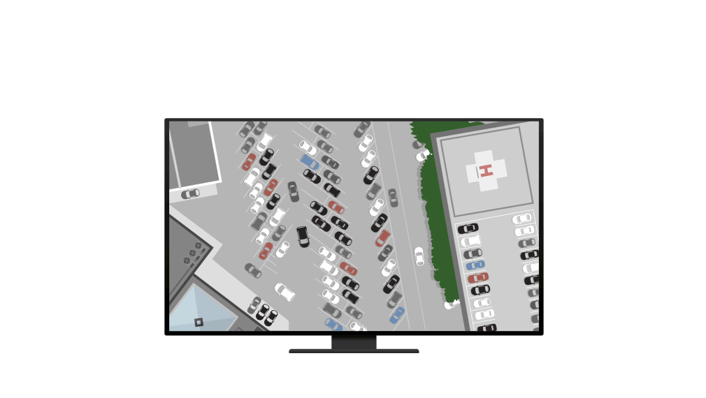 Aerial view of a parking lot filled with vehicles representing object detection being applied