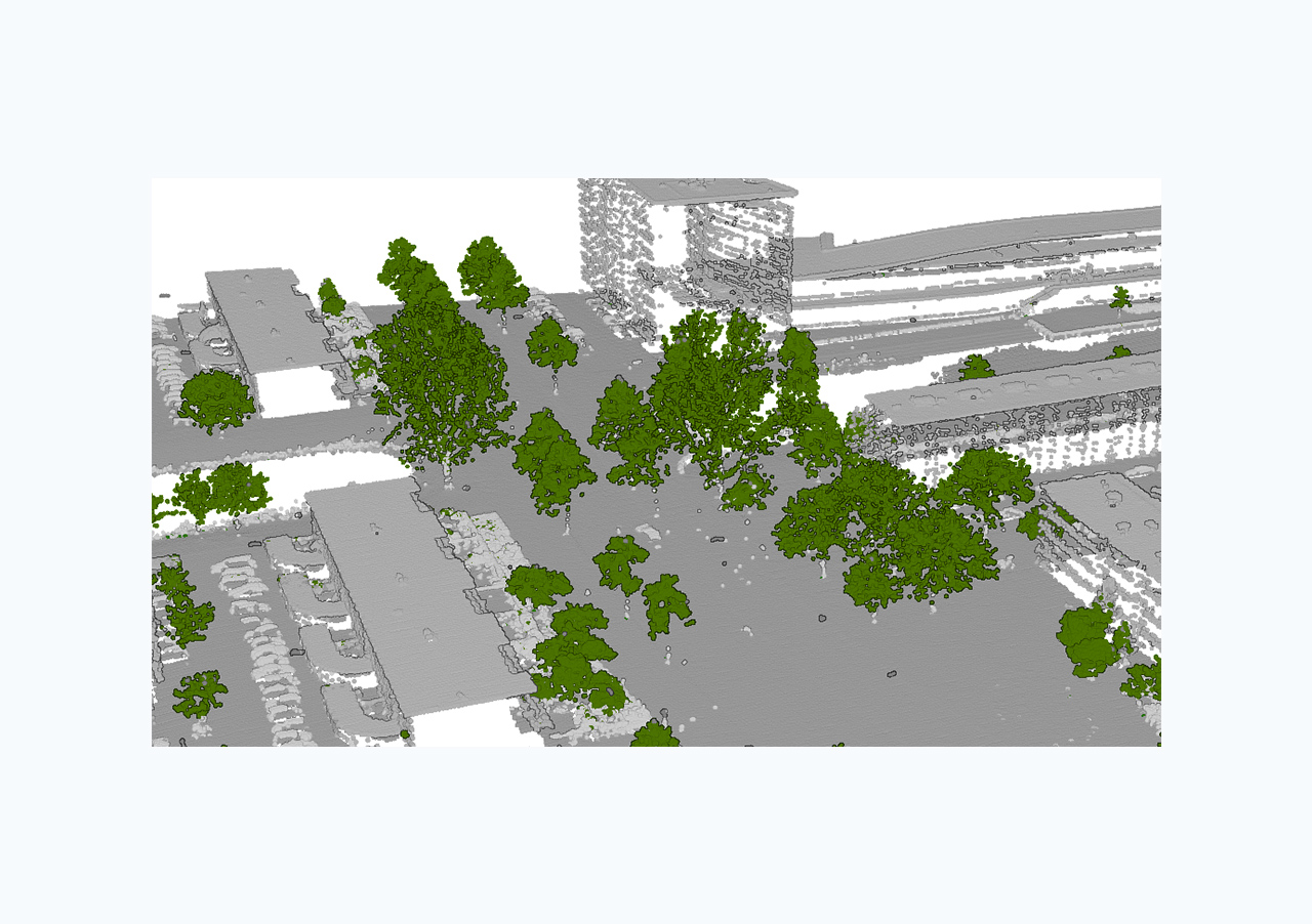 Digital image depicting tree point classification with green trees and gray buildings 