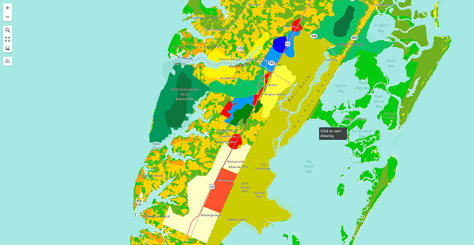 Green map with blue ocean in ArcGIS GeoPlanner showing overlay vegetation, hydrology, and viewsheds with land use information