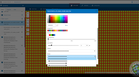 Écran d’ordinateur affichant un texte et des carrés multicolores représentant la nouvelle symbologie de couche de données d’un projet GeoPlanner