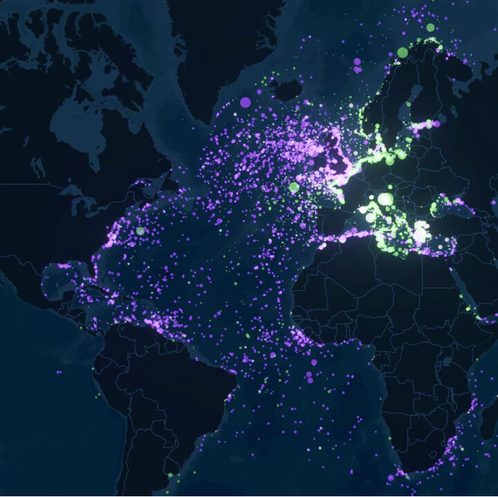 A dark theme map with urple and green dots scattered across the Atlantic Ocean and along the European, African, and American coastlines