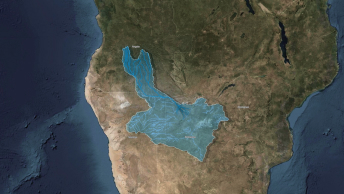 A digital image of land and water representing the Okavango waterways, with a body of water highlighted in blue