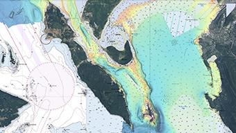 A digital map of land and water with scattered coordinates representing a nautical chart