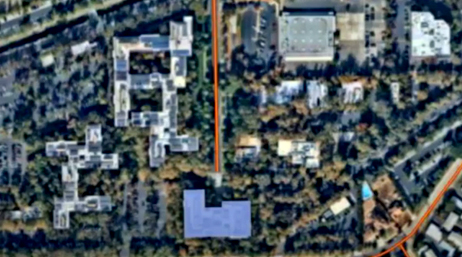A screencap from the featured videos showing an aerial photo of an industrial complex with roads marked in red