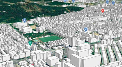 A digital twin showing 3D buildings overlaid on satellite imagery with icons marking various buildings