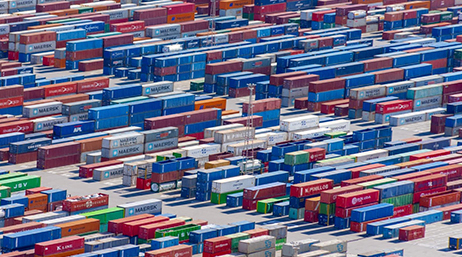 Large shipping containers in a port container yard
