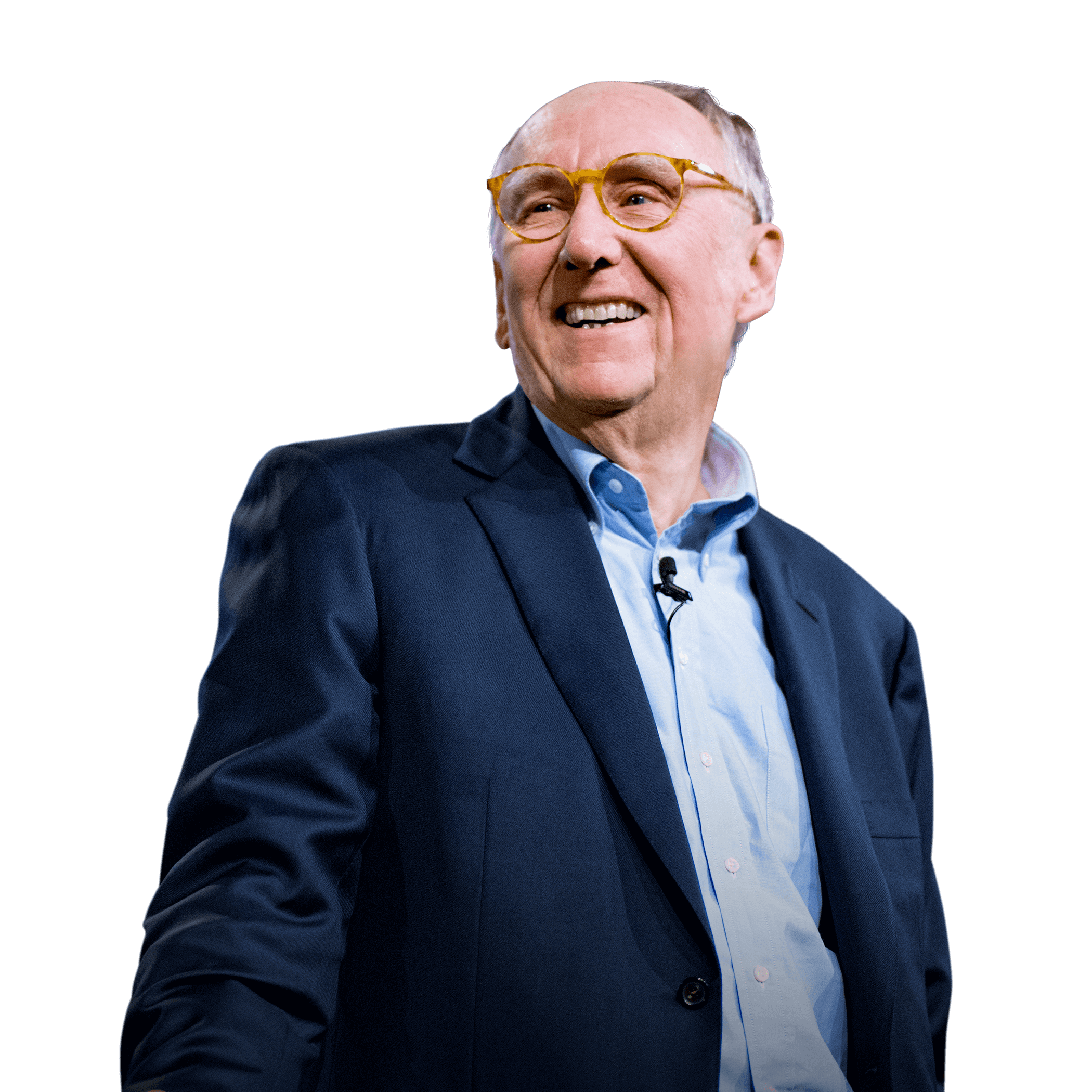 Esri President Jack Dangermond smiling on the Plenary Session stage at the Esri User Conference