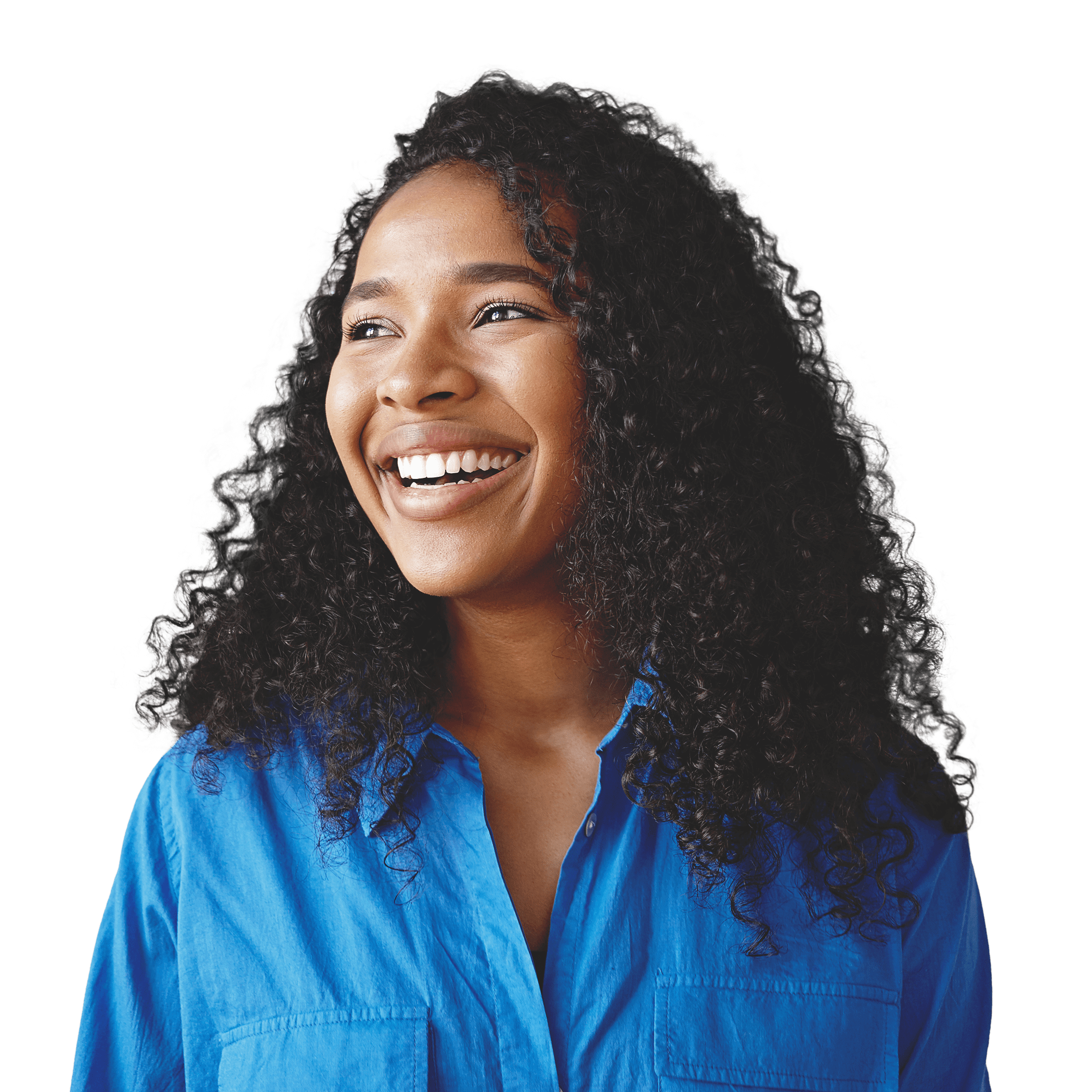 Grinning person with curly dark hair in a blue shirt