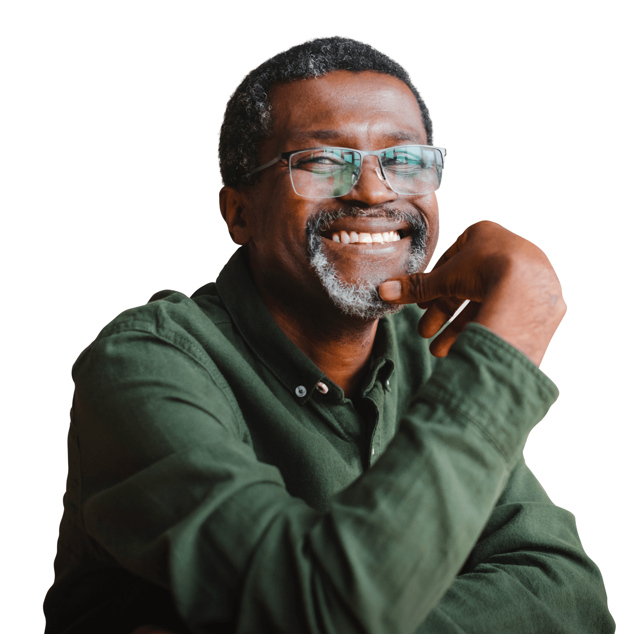 Smiling person with a goatee wearing glasses and a green dress shirt touching their hand to their chin