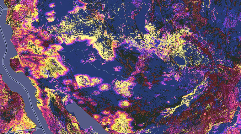 Colorized geospatial raster visualization of the Western United States, with bright yellow, pink, and purple patterns revealing spatial relationships and data clusters across the landscape