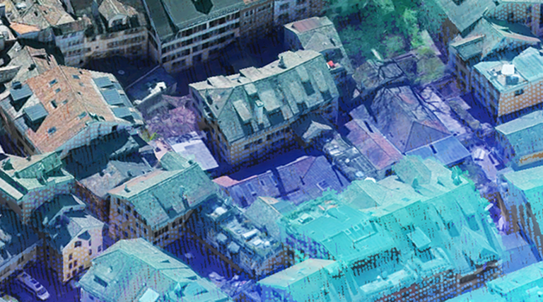Aerial view of a dense urban neighborhood overlaid with a blue-to-purple heatmap-style visualization