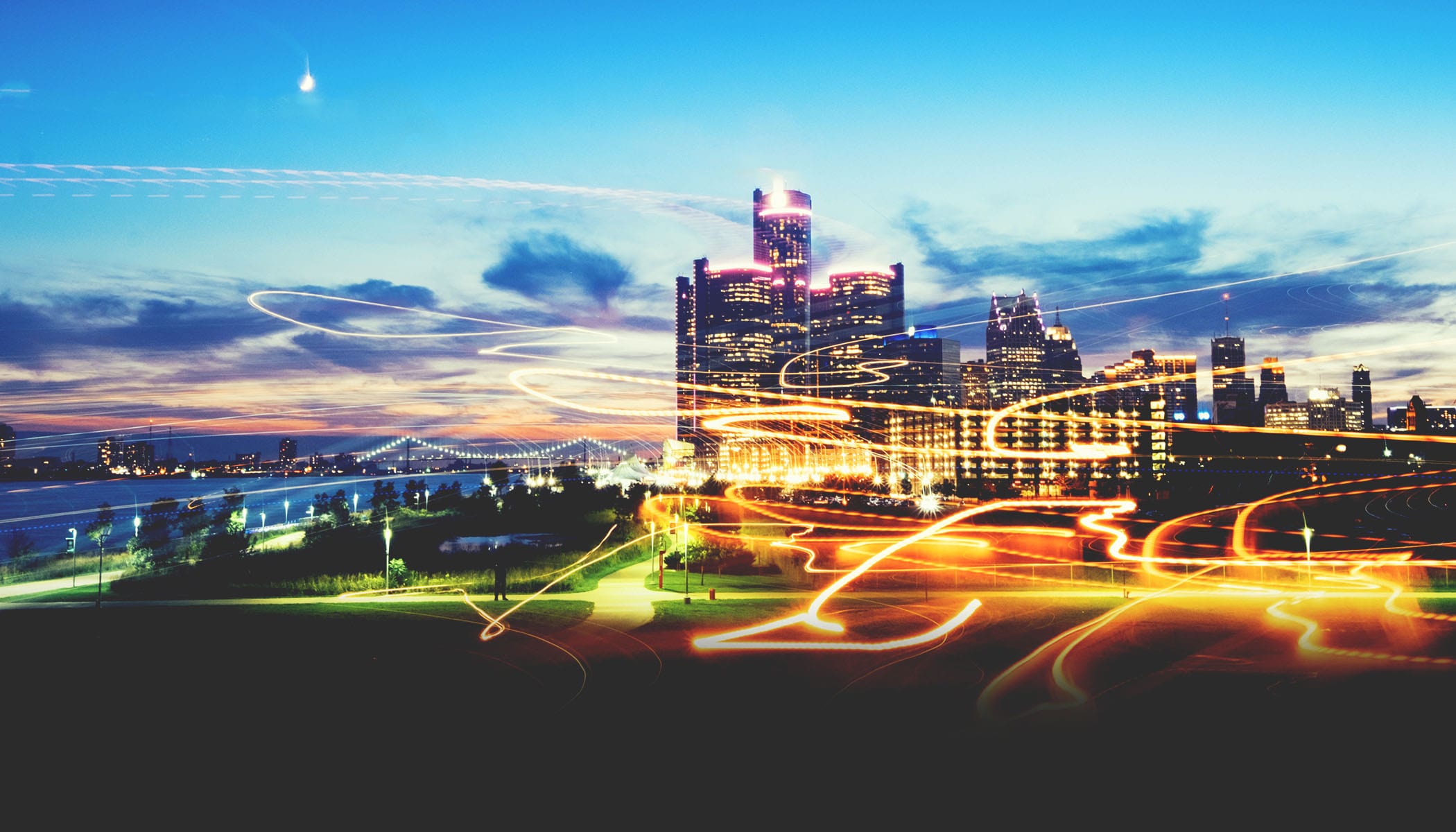 A city at night with light trails