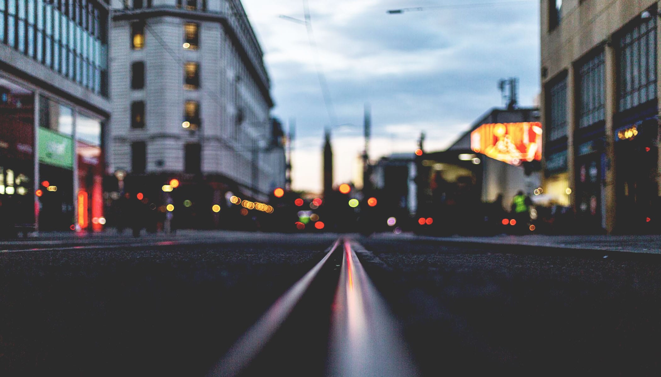 A city street at night in soft focus