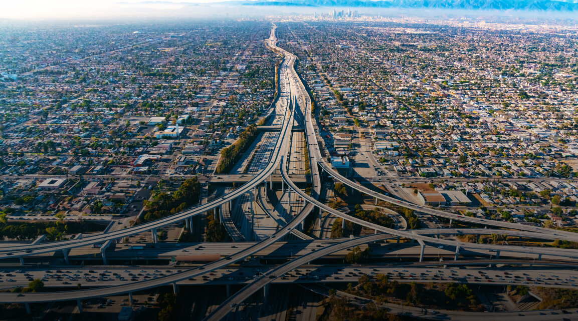 An aerial view of overlapping highway overpasses and roads in Boston