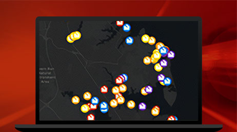 A map with different colored house icons that show where property damage incidents have occurred 