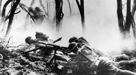 Black and white photo of soldiers in battle