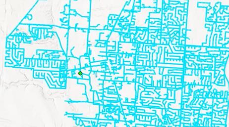 A map of a city with streets and infrastructure highlighted with blue and purple lines and five dispersed red squares highlighting key locations