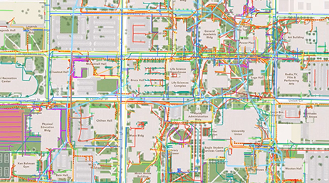 A color-coded map of a university campus showing various buildings and accessible pathways with distinct line styles and colors