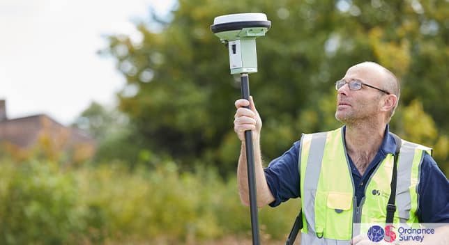 Surveyor out in the field with equipment