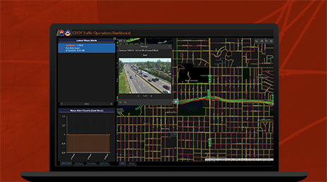 A graphic of a laptop monitor displaying a colorful street map overlaid with photos and graphs