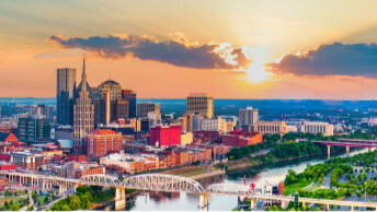 An aerial view of the Nashville skyline at sunset