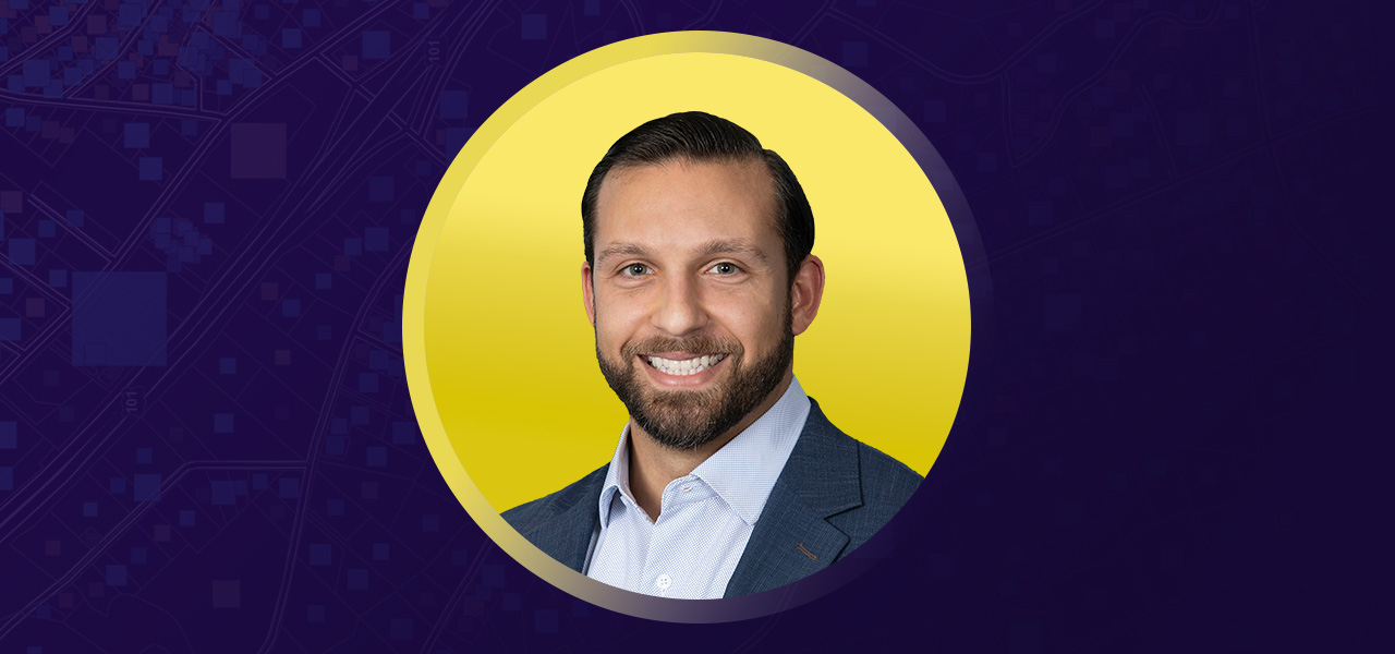 Rami AlyGad wearing business attire and smiling overlaid on a yellow and purple background