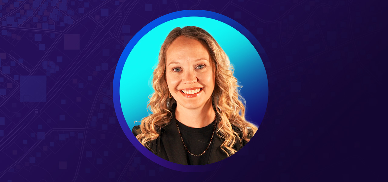 Lindsay Dreckman wearing black clothing and smiling overlaid on a purple and turquoise background